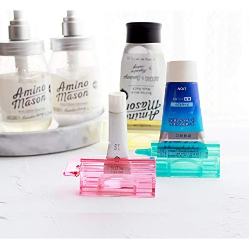 RAYNAG 2 Pack Toothpaste Tube Squeezer Roller Holder, Rolling Tubes Squeezer ...